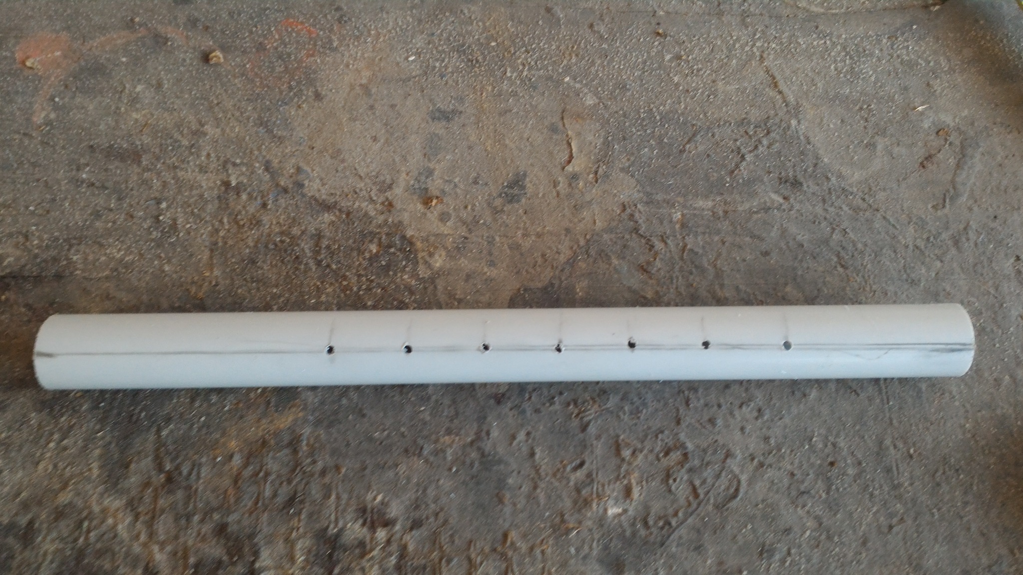 Front hole positions marked and drilled