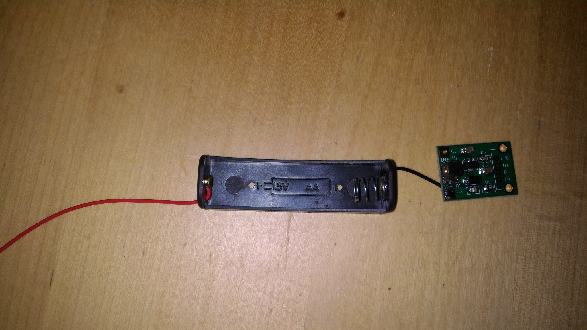 Battery holder and boost converter