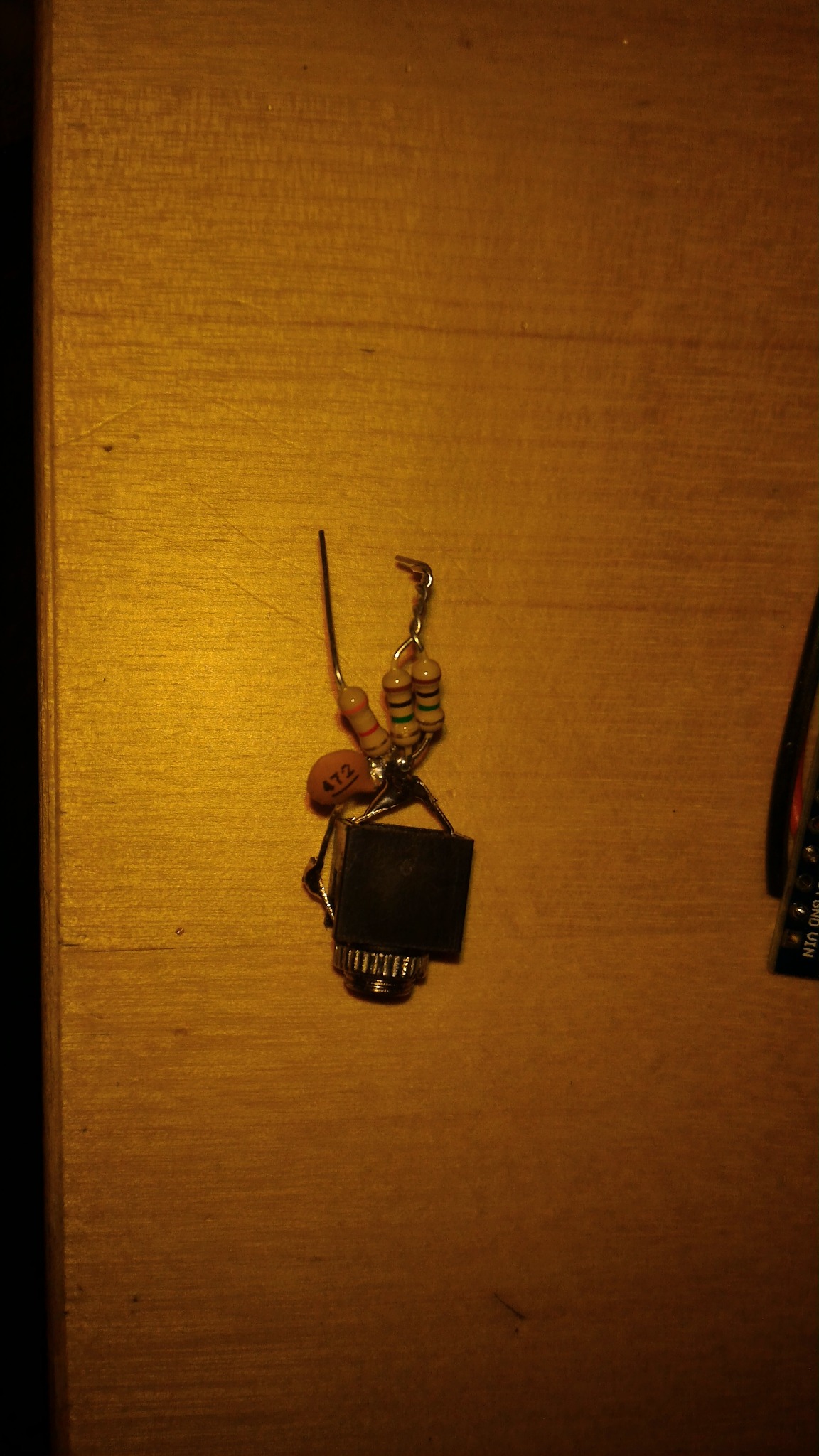 Audio jack with passive components assembled